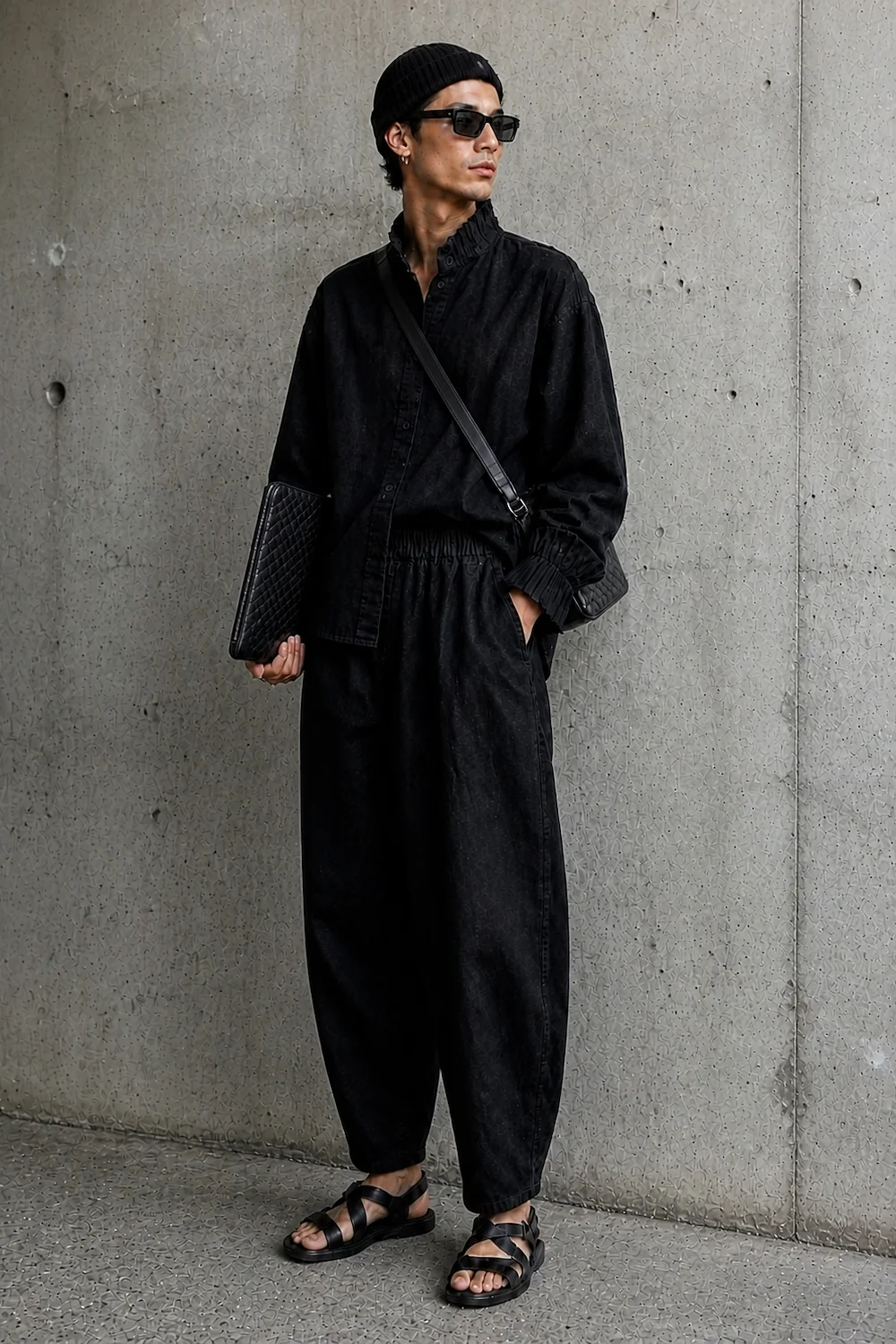 the black denim shirt and trousers worn together